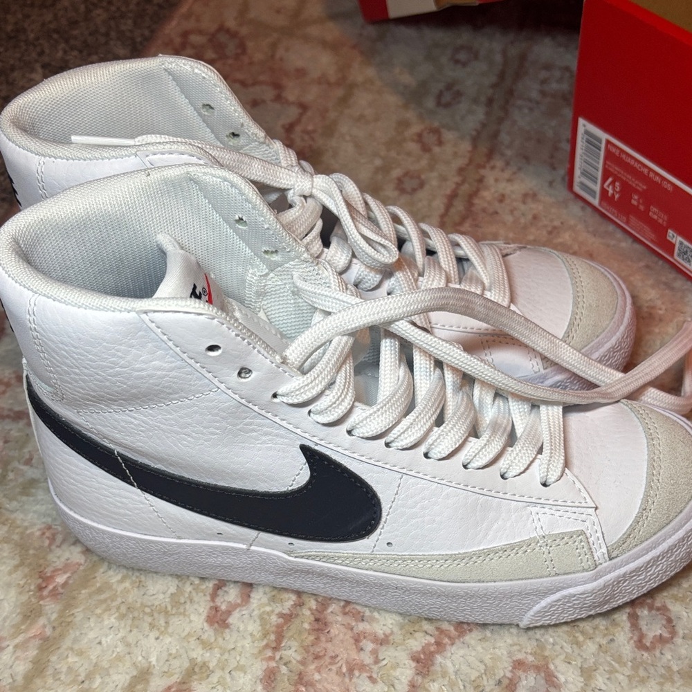 Nike White High-Top Sneakers with Black Swoosh - Picture 3 of 4